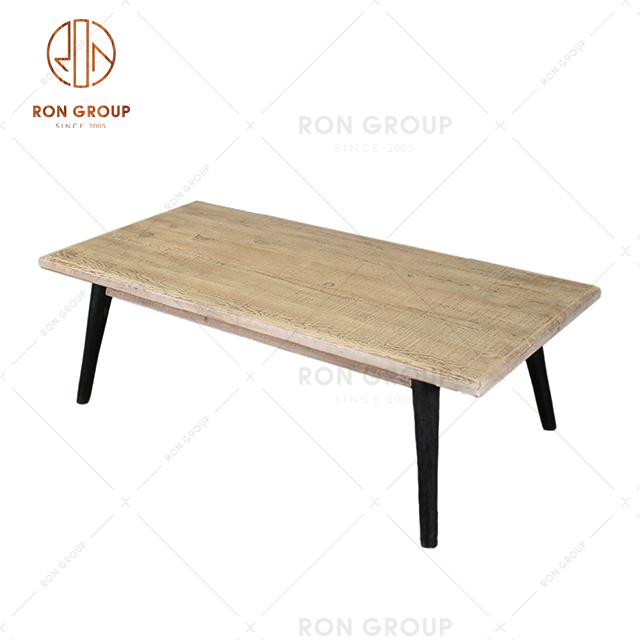 Long rectangular table with customizable size is supported with high quality natural wood top and metal feet